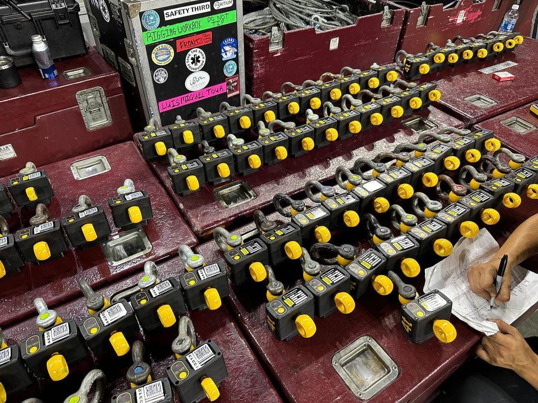 Many Eilon load cells lined up in preparation for use as part of the Ron StageMaster load monitoring system